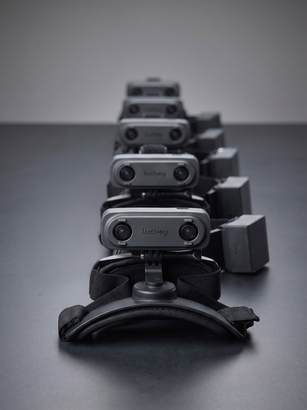 A fleet of Luckey head-mounted stereo capture devices arranged and ready for real-world data collection